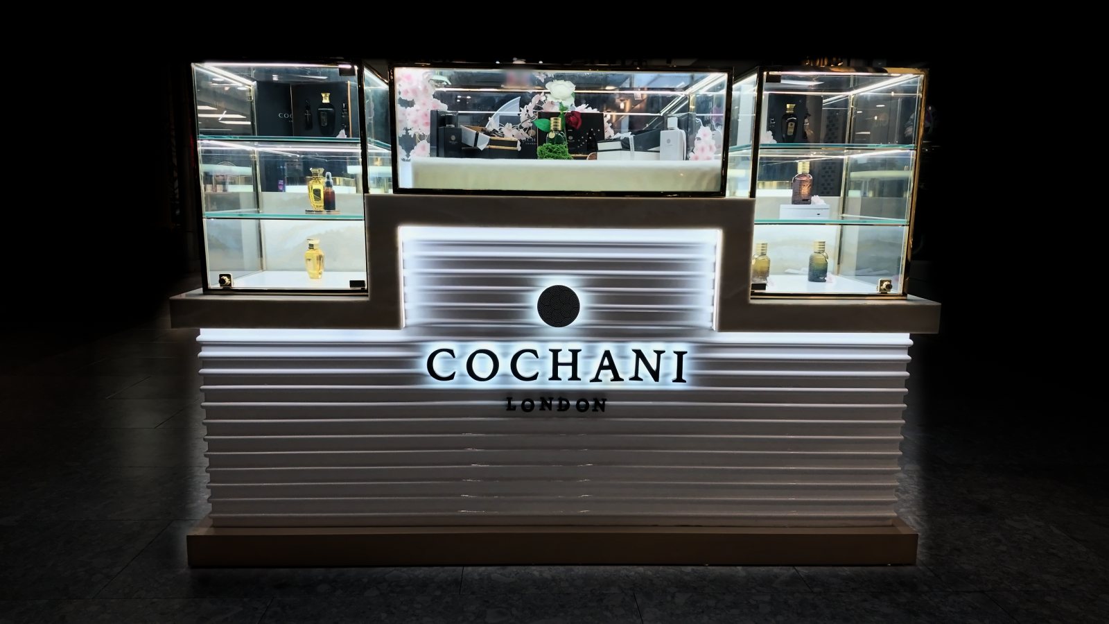 Cochani London kiosk with halo-lit letters and LED-lined panels