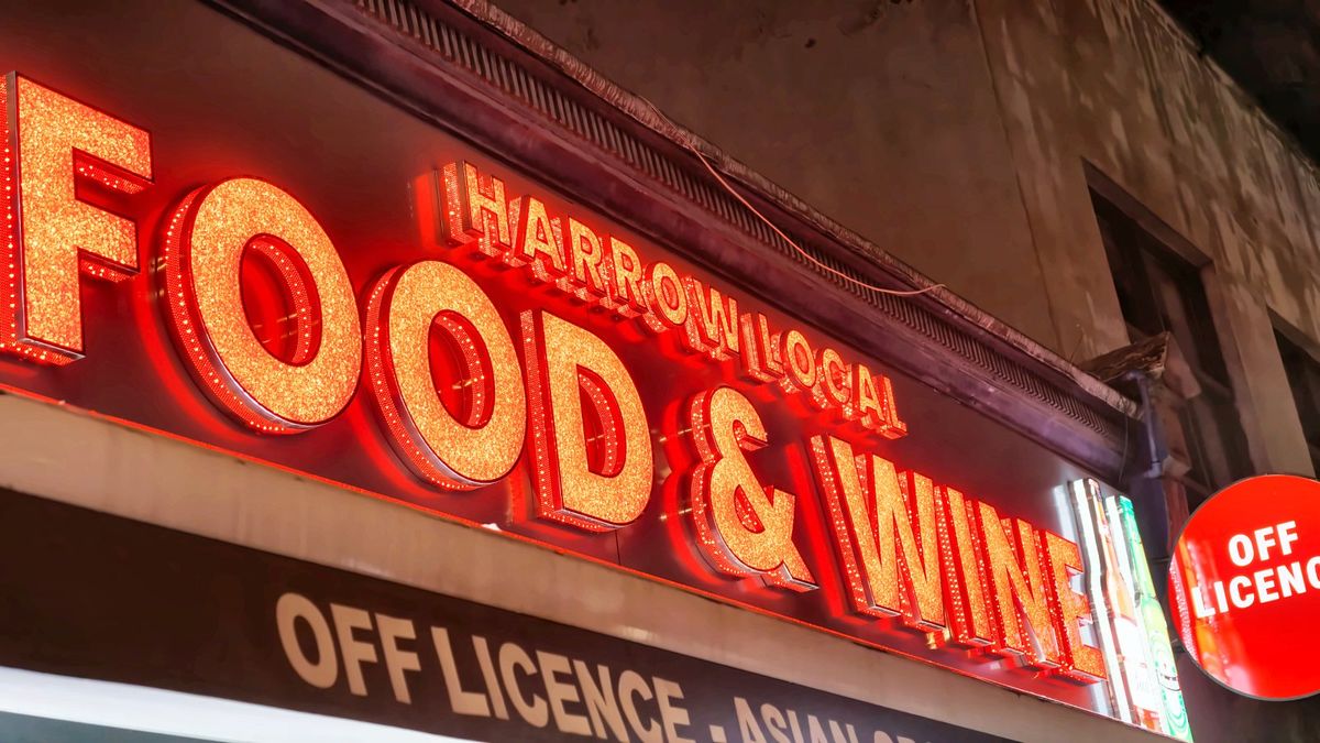 Harrow Local Food and Wine sign lit in red