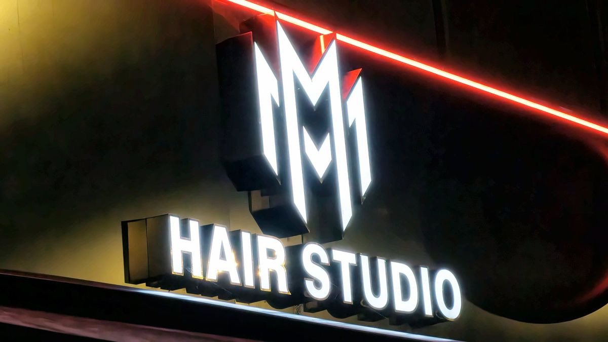 M1 Hair Studio illuminated logo and letters
